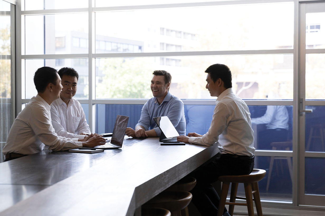 One Fell Swoop - men in meeting