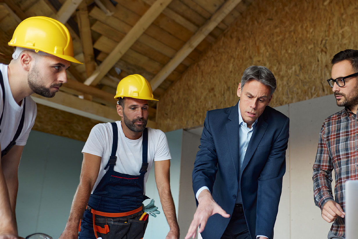 One Fell Swoop - men at building site