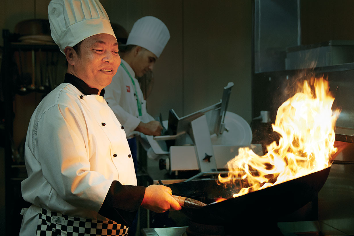 One Fell Swoop - chef cooking with wok