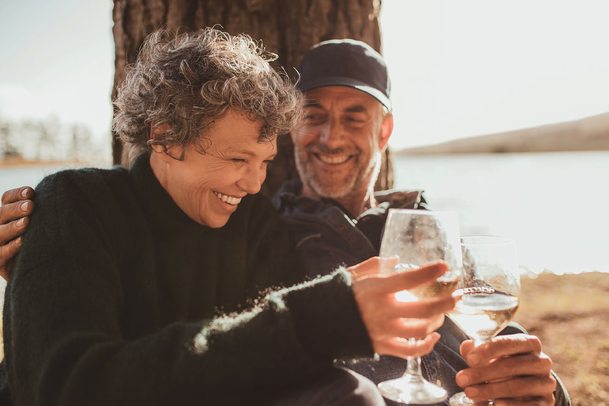 One Fell Swoop - senior smiling drinking